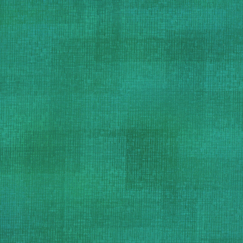 Swatch of emerald green fabric with tonal thatched texturing.