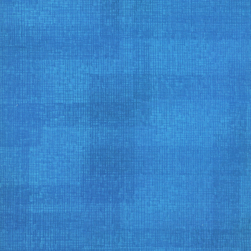 Swatch of ocean blue fabric with tonal thatched texturing.