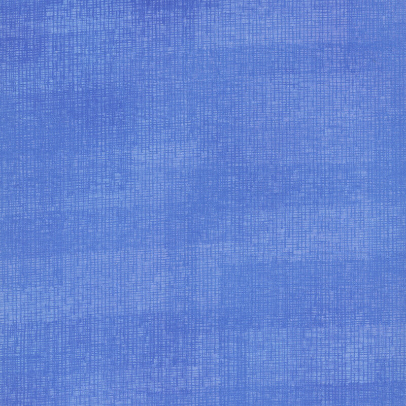 Swatch of periwinkle fabric with tonal thatched texturing.