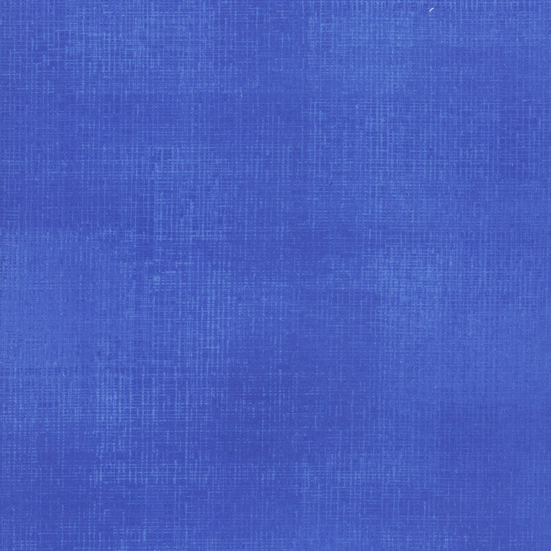 Swatch of dark periwinkle fabric with tonal thatched texturing.