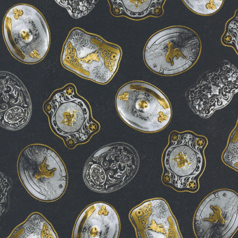 Silver and gold ornate western belt buckles on a textured black background.
