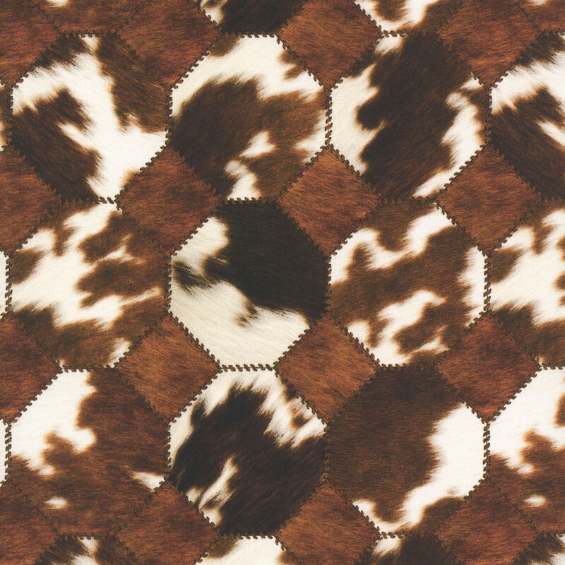 dark brown, chestnut and white cowhide print in a geometric pattern with stitching details.