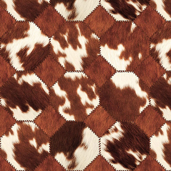 Brown, chestnut and white cowhide print in a geometric pattern with stitching details.