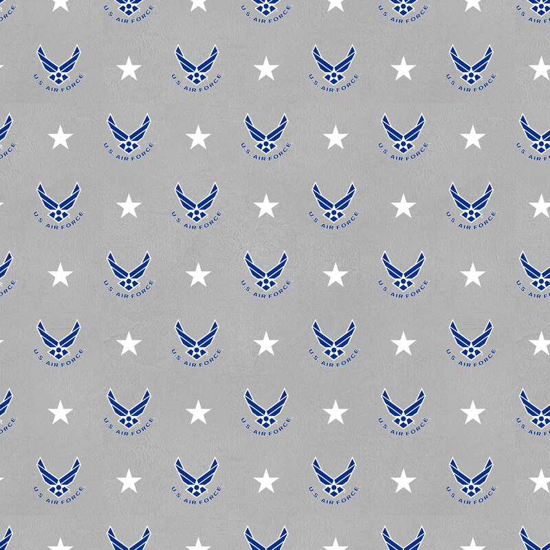 Gray fabric with a pattern of Air Force seals and stars on a textured background.