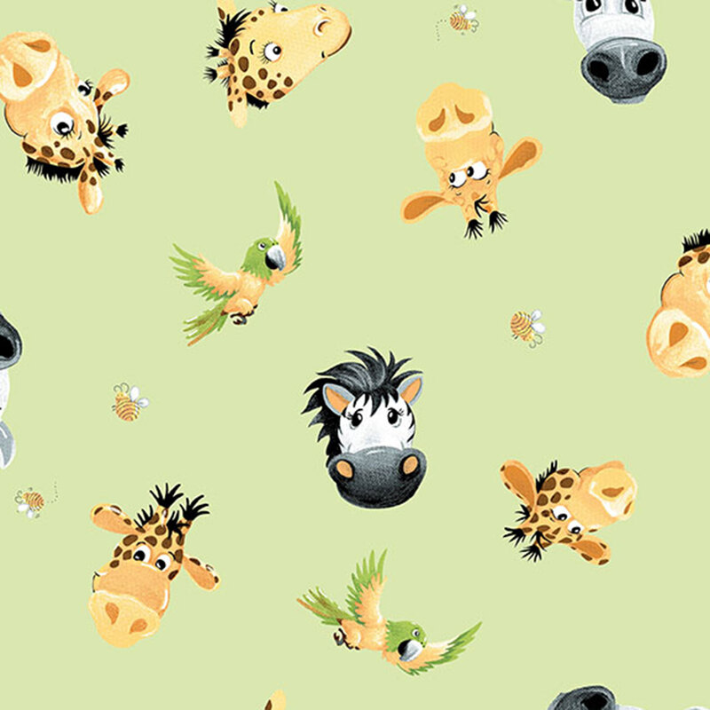 Green fabric with a playful pattern of cartoon-style safari animals.