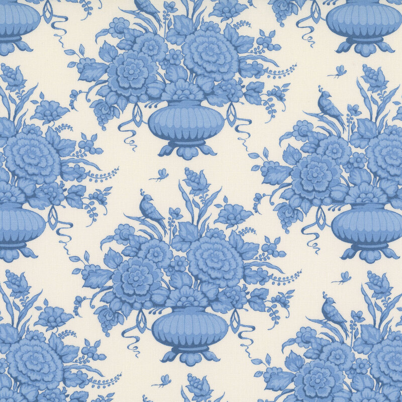White fabric with a Chinoiserie-style design with flower pots, florals, birds, dragonflies, and other decorative motifs for an elegant, intricate look.