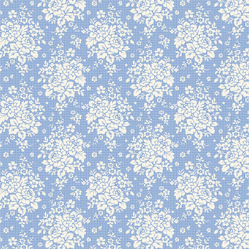 Blue fabric with an geometric pattern of floral clusters and leaves, creating a refined and decorative design.