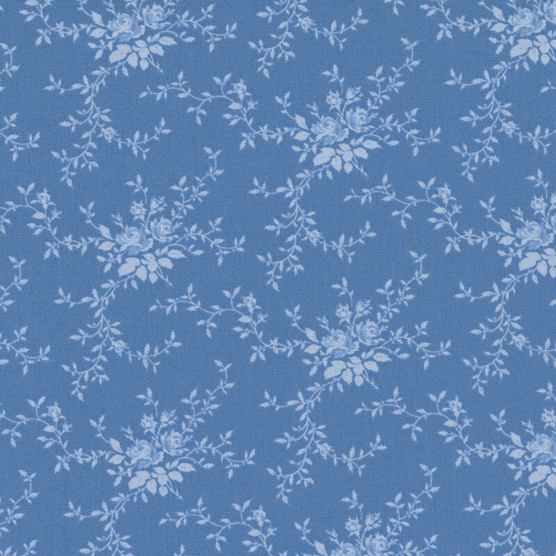 Blue fabric with stylized floral clusters with leaves and vines for a graceful, flowing design.