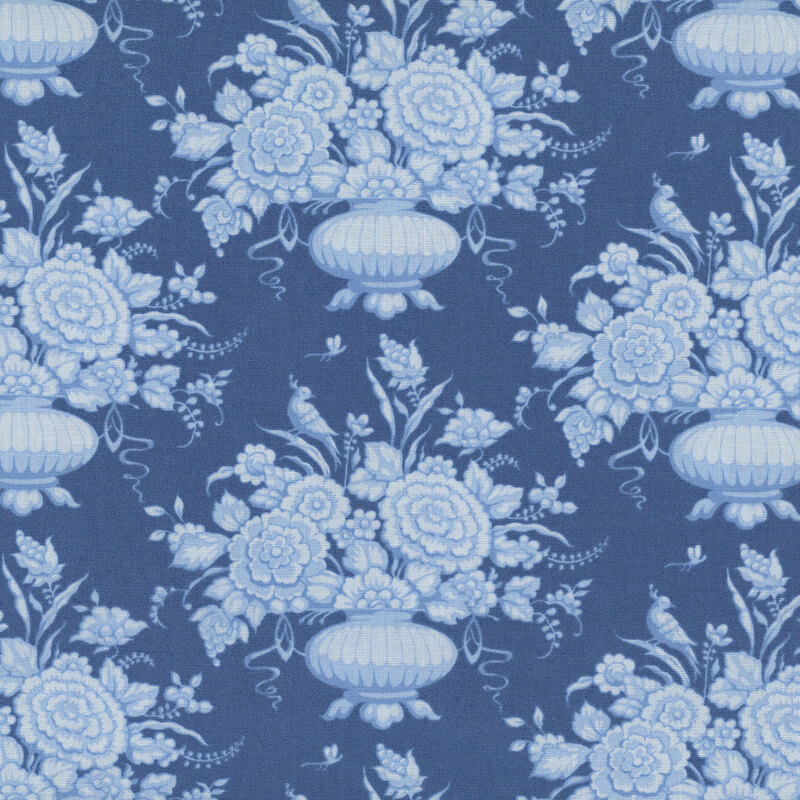 Blue fabric with a Chinoiserie-style design with flower pots, florals, birds, dragonflies, and other decorative motifs for an elegant, intricate look.