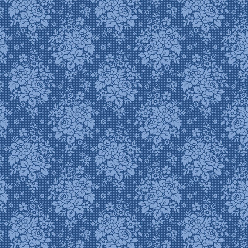 Blue fabric with an ornamental pattern of floral clusters and leaves, creating a refined and decorative design.