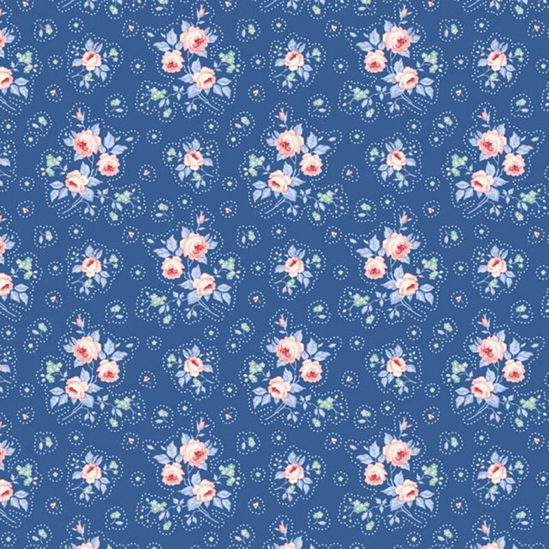 Blue fabric with stylized floral clusters, combining small green blossoms with larger pink blooms for a vibrant, balanced design.