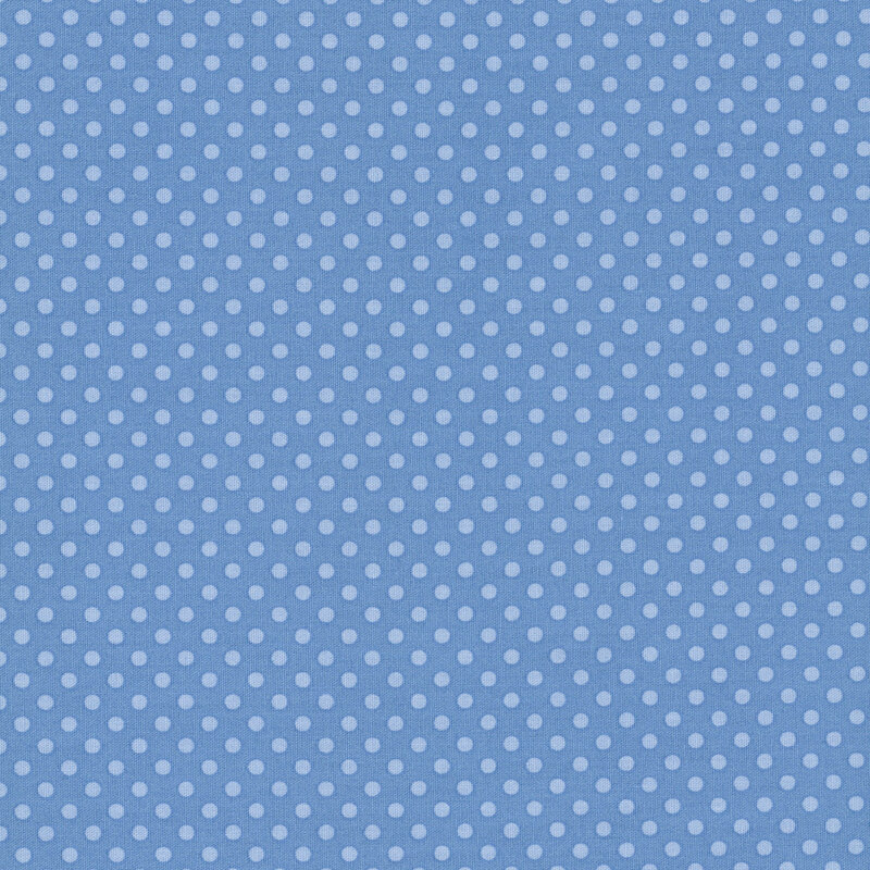 Blue fabric with a classic pattern of polka dots for a crisp, timeless look.