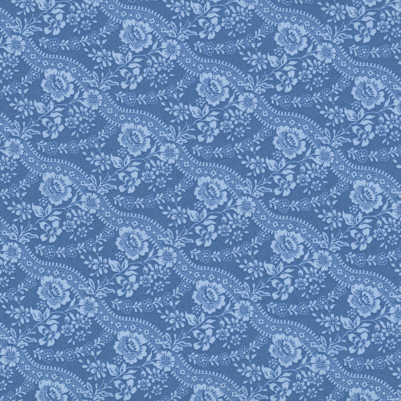 Lapis blue fabric with stripes of stylized flowers paired with wavy lines for a graceful, flowing design.