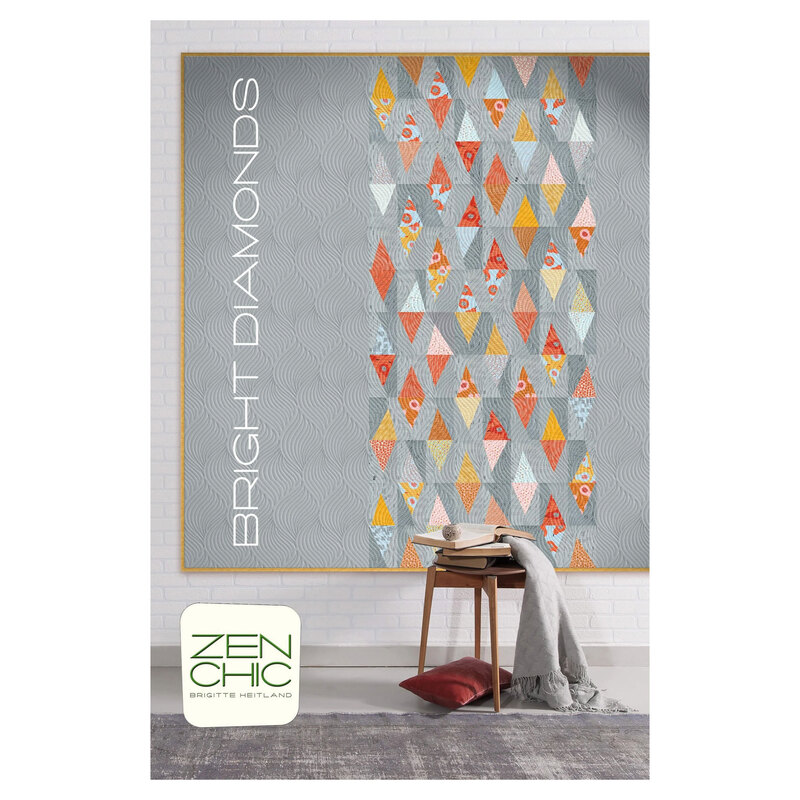 The front cover of the Bright Diamonds pattern, featuring a digital image of the finished quilt staged above furniture and decor.