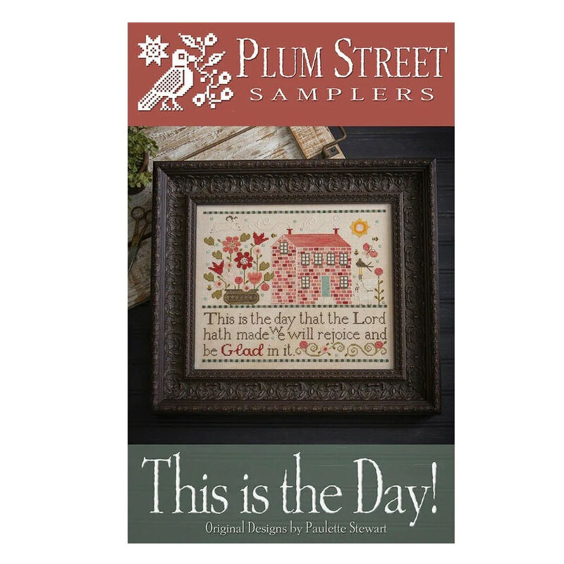 Front of pattern showing the finished and framed cross stitch design styled with decor.