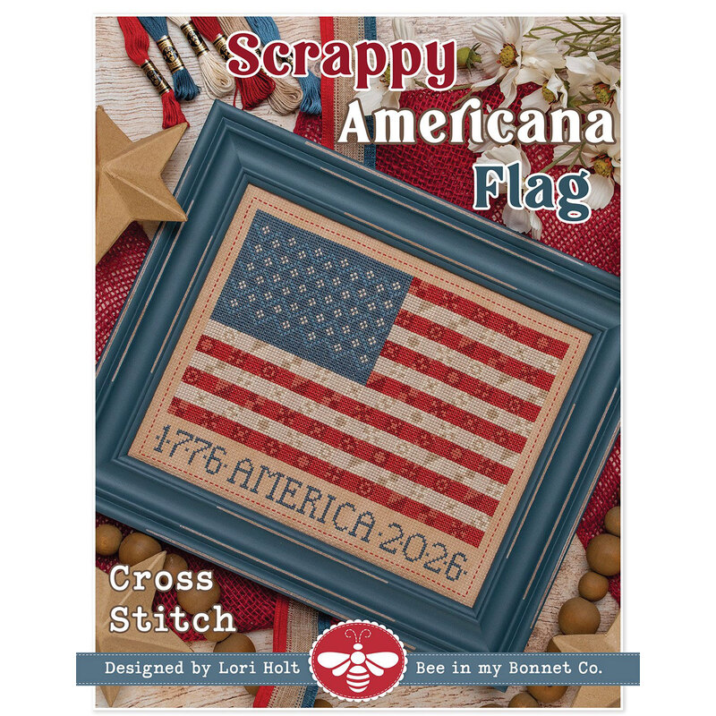 Framed cross-stitch design of a flag with 1776 America 2026, featuring red and blue colors.