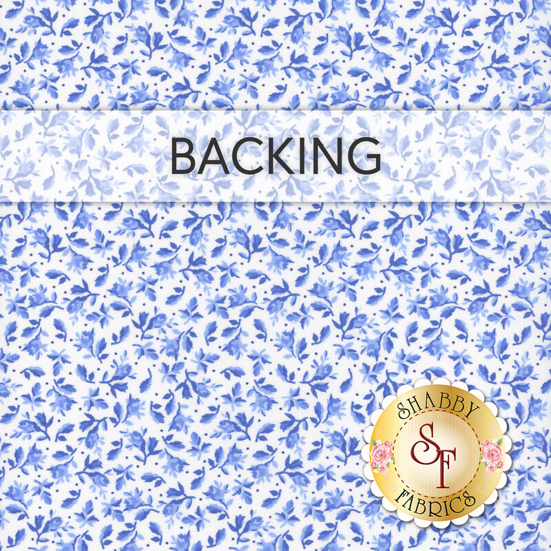 A white fabric swatch decorated with small blue leaves and florals. A banner across the top reads backing and a golden shabby fabrics logo rests in the bottom right corner. 