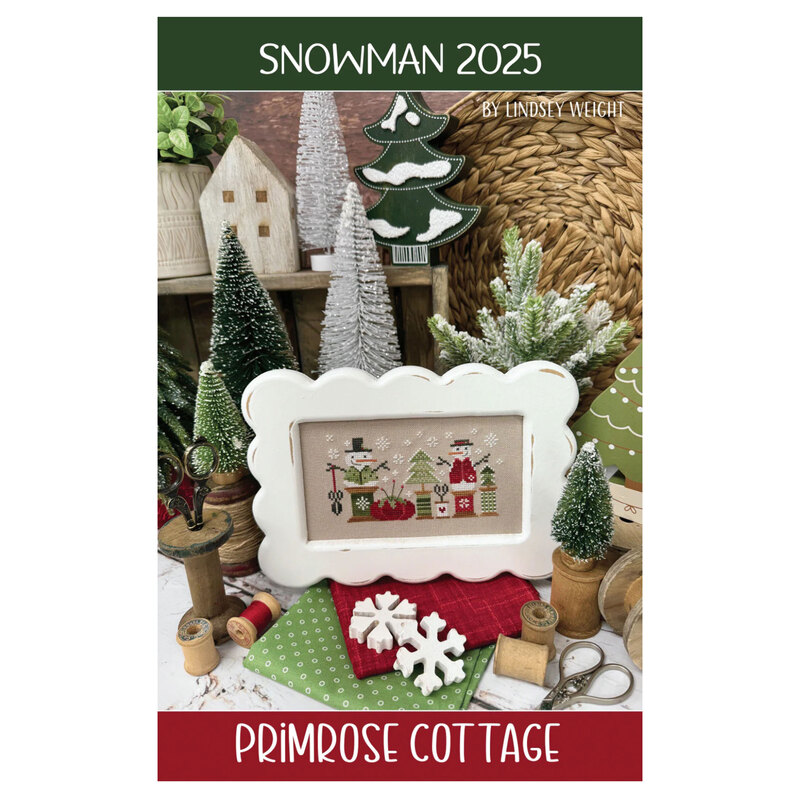 Front cover of the Snowman 2025 pattern booklet featuring a photo of the completed project with title and designer info.