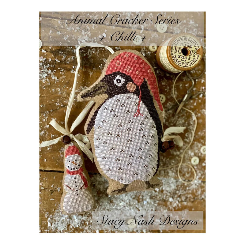 Front image of the Animal Cracker Series - Chilli featuring the finished project penguin and snowman pinkeep.