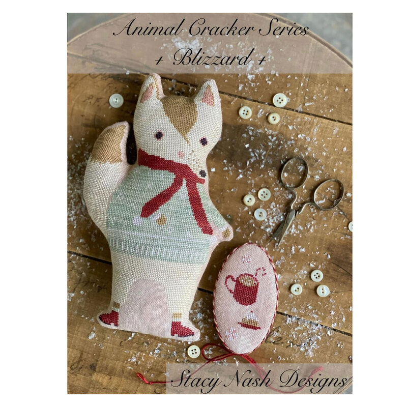 Front image of the Animal Cracker Series - Blizzard featuring the finished project fox and needle book.