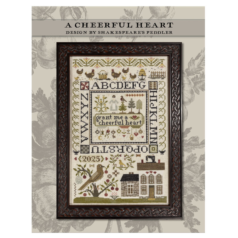 Front of pattern showing the completed cross stitch framed and staged with coordinating décor.