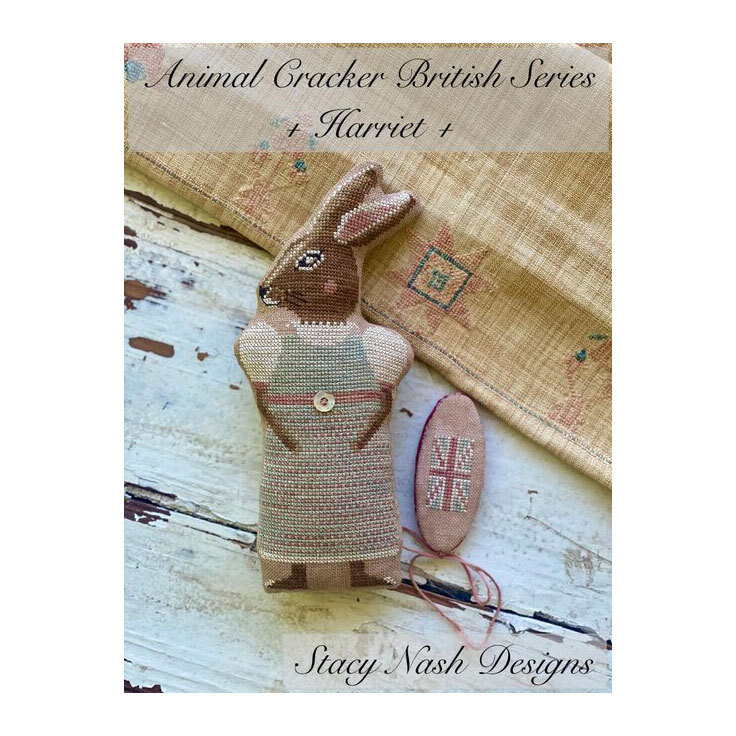 Front image of the Animal Crackers British Series - Harriet featuring the finished project rabbit and needle book.