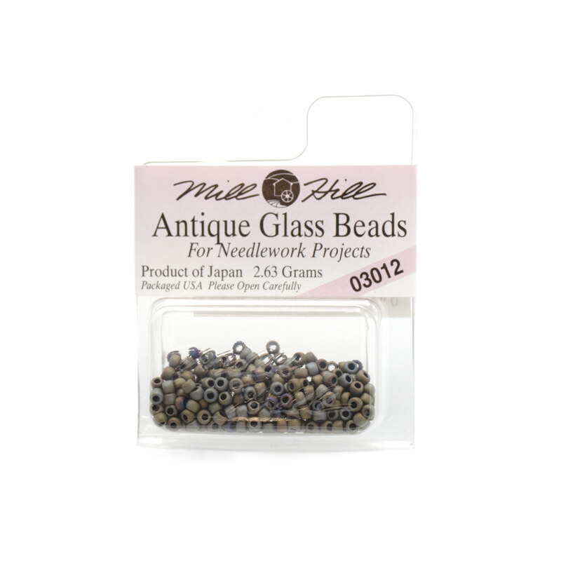 A package of Mill Hill Antique Glass Seed Beads in the color Autumn Heather.