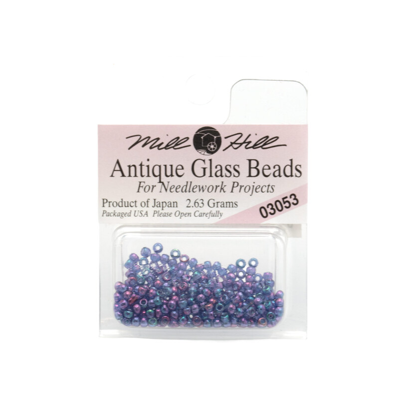 A package of Mill Hill Antique Glass Seed Beads in the color Purple Passion. 