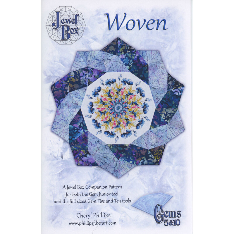 The front of the Woven pattern, showcasing the finished table topper on a mottle blue background.