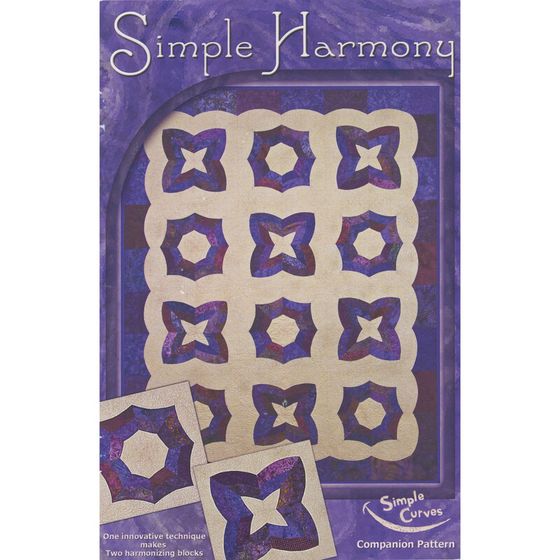 The front of the pattern, showcasing the finished quilt on a purple background.