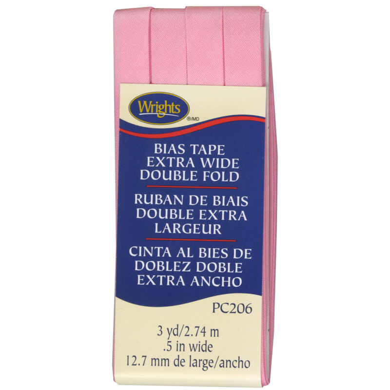 Pink bias tape in packaging labeled Bias Tape Extra Wide Double Fold.