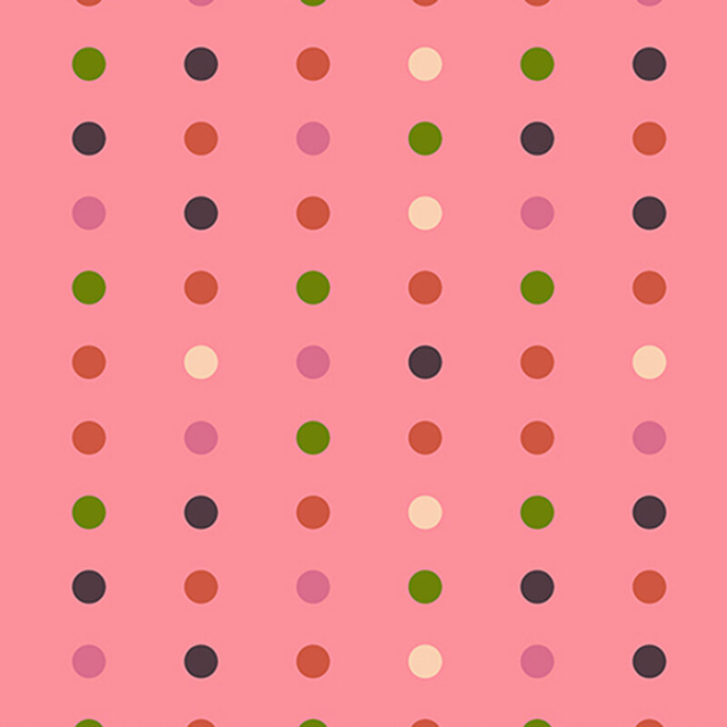 This pink fabric features a minimalist polka dot pattern.