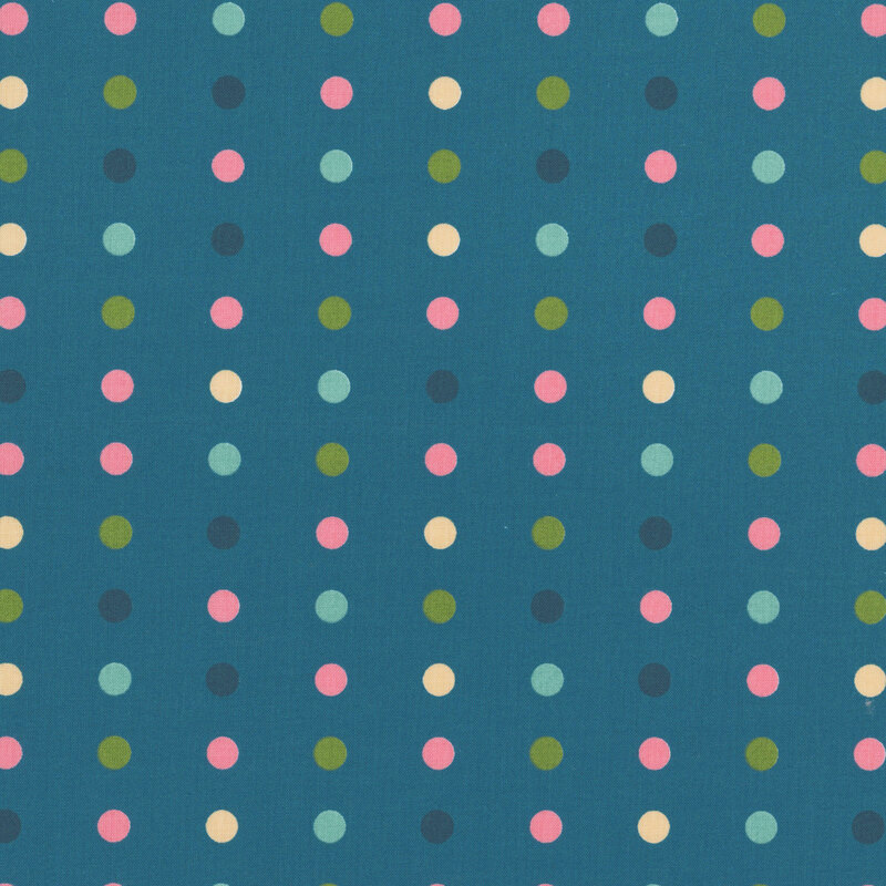 Teal blue fabric with a minimalist polka dot pattern.