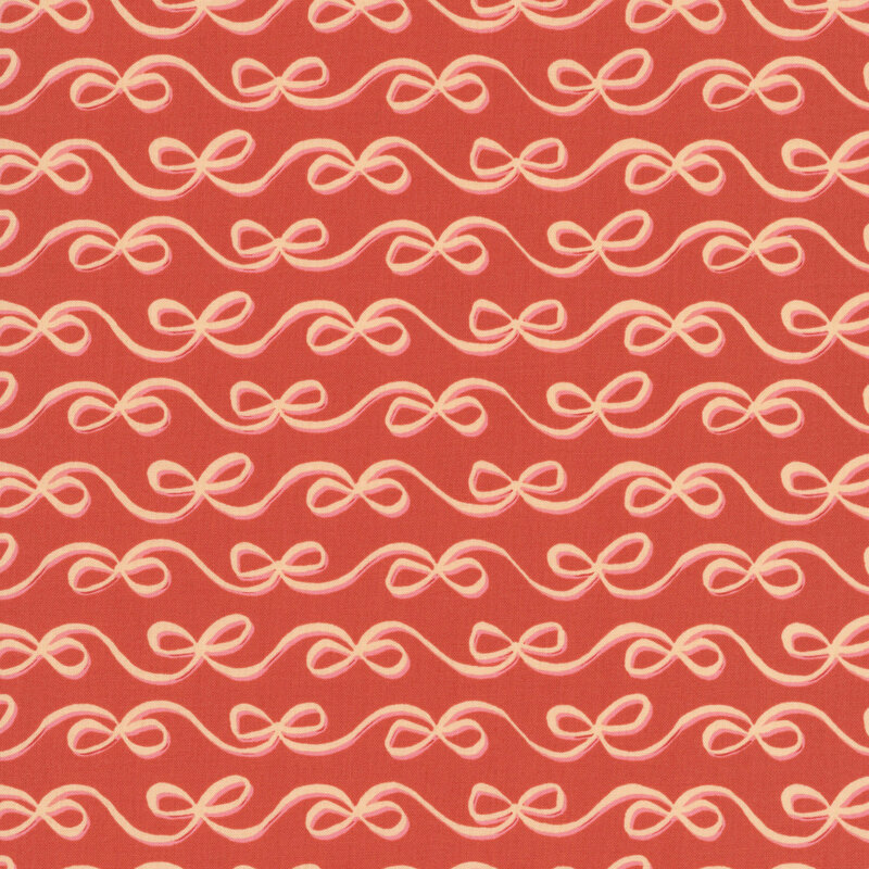Sienna fabric with a minimalist design of flowing stripes made of ribbons.