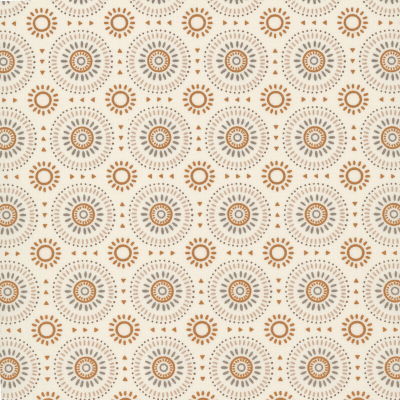 Light beige fabric featuring a geometric sunburst pattern in hues of gold, tan, and taupe. 