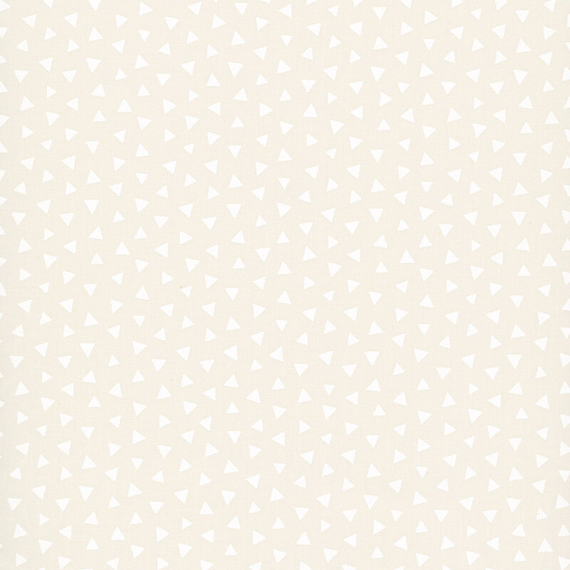 Light beige fabric featuring a tossed pattern of ivory triangles.
