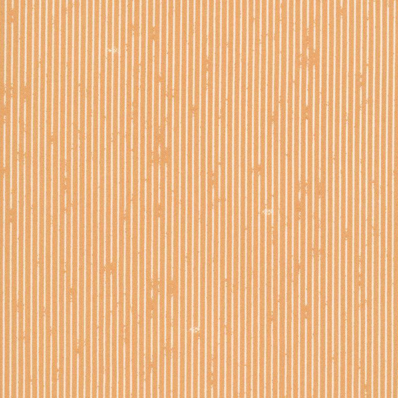 This butterscotch fabric features rustic white pin stripes. 