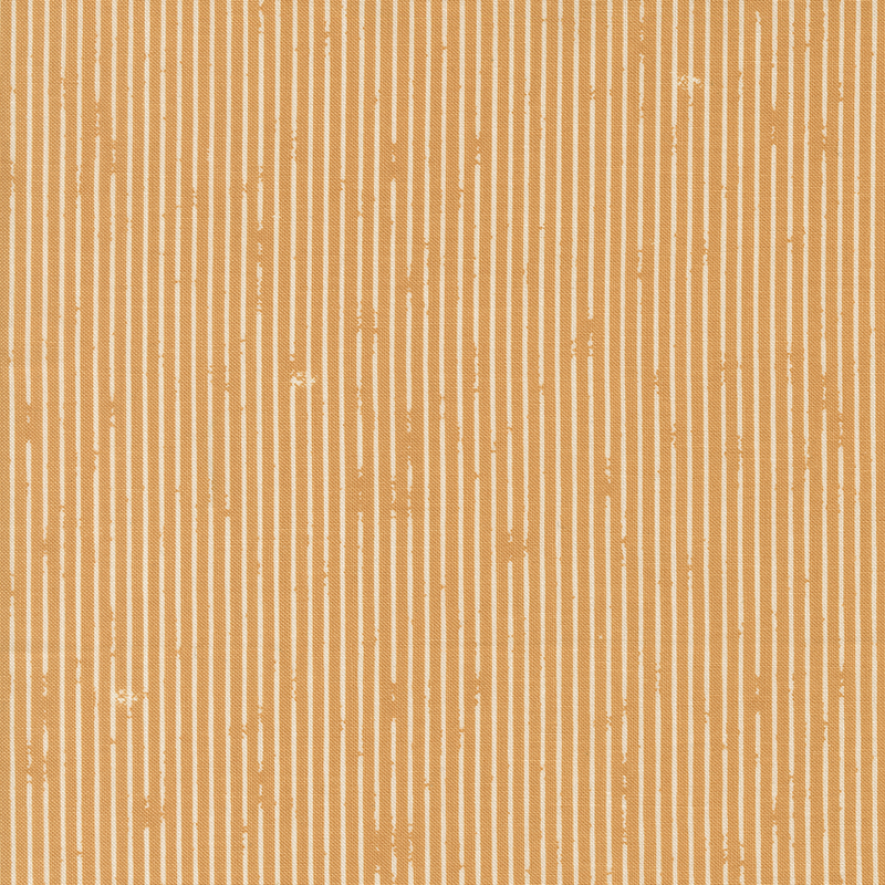 This butterscotch fabric features rustic white pin stripes. 