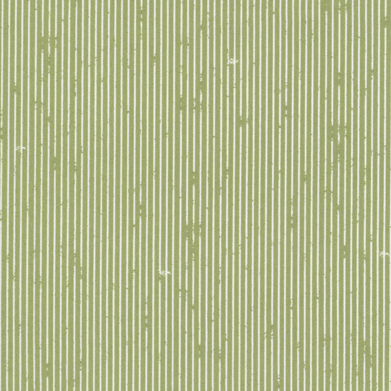 This sage green fabric features rustic white pin stripes. 