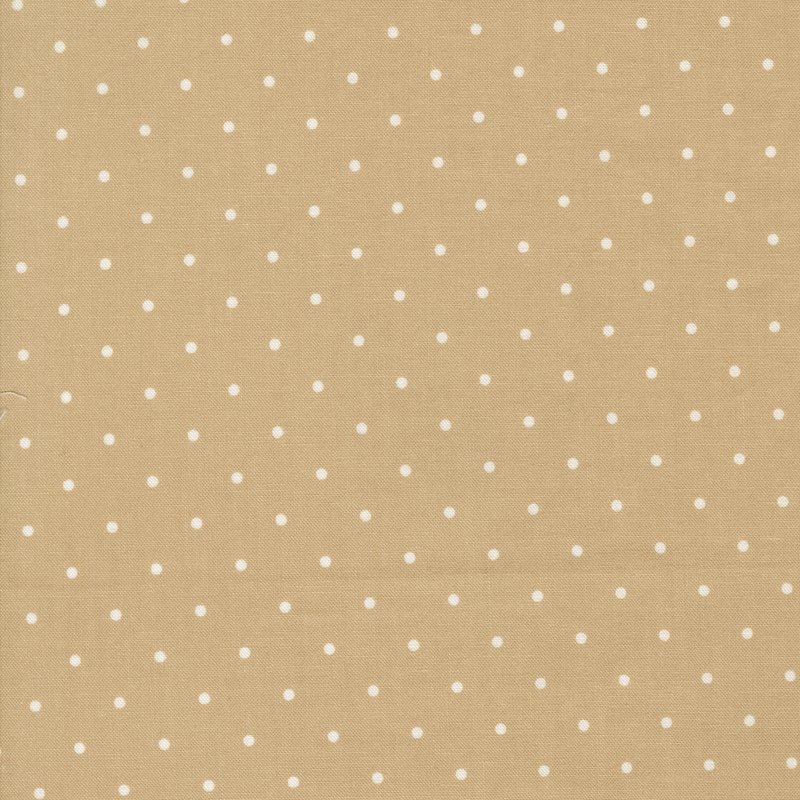 Tan fabric with a white polka dot pattern.