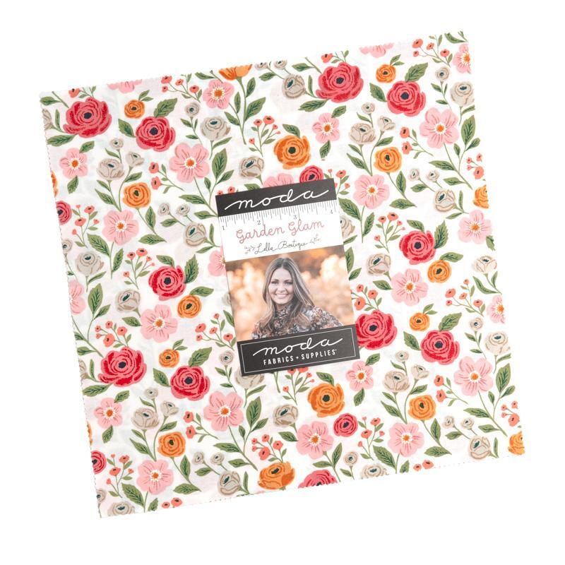 The Garden Glam Layer Cake in its packaging, isolated on a white background.