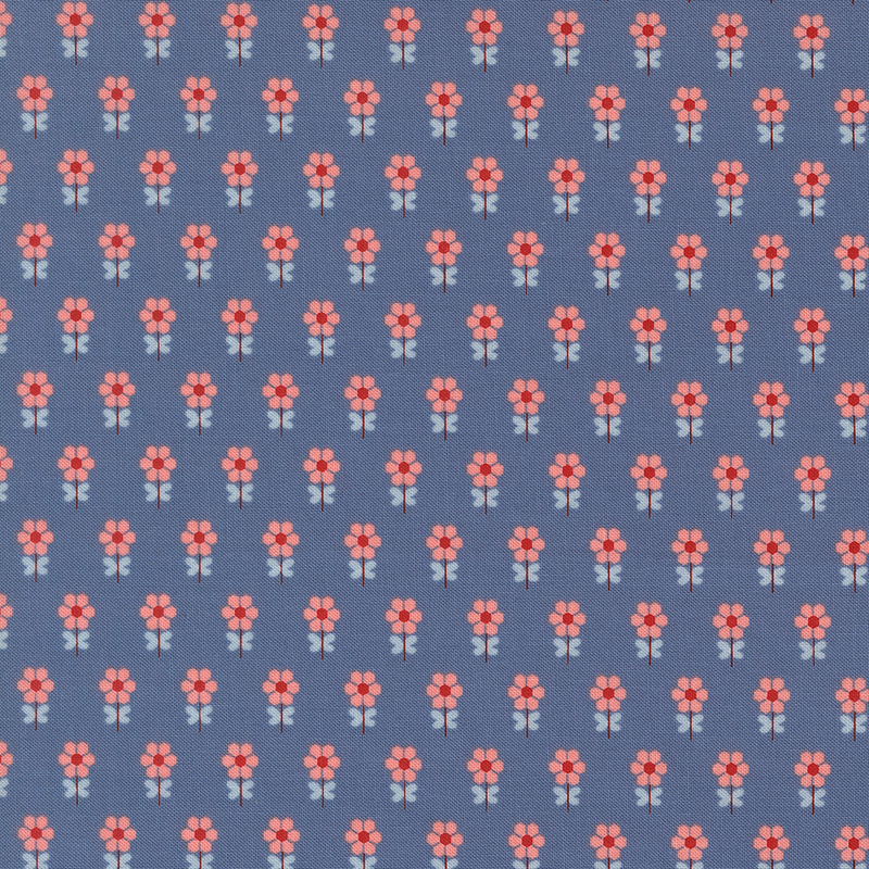 Denim blue fabric featuring a repeating pattern of stylized peach flowers with blue leaves..