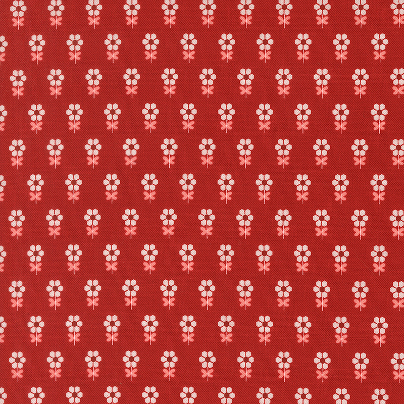Cardinal red fabric featuring a repeating pattern of stylized ivory flowers with pink leaves.