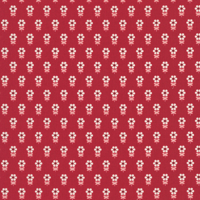 Cardinal red fabric featuring a repeating pattern of stylized ivory flowers with pink leaves.