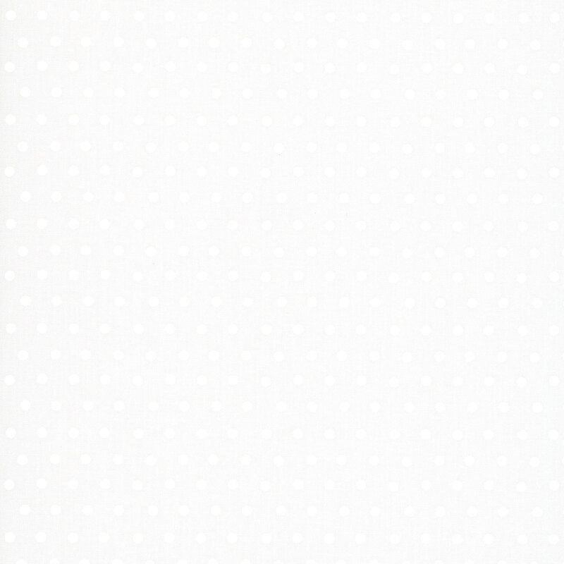 Snow white fabric with a white polka dot pattern.