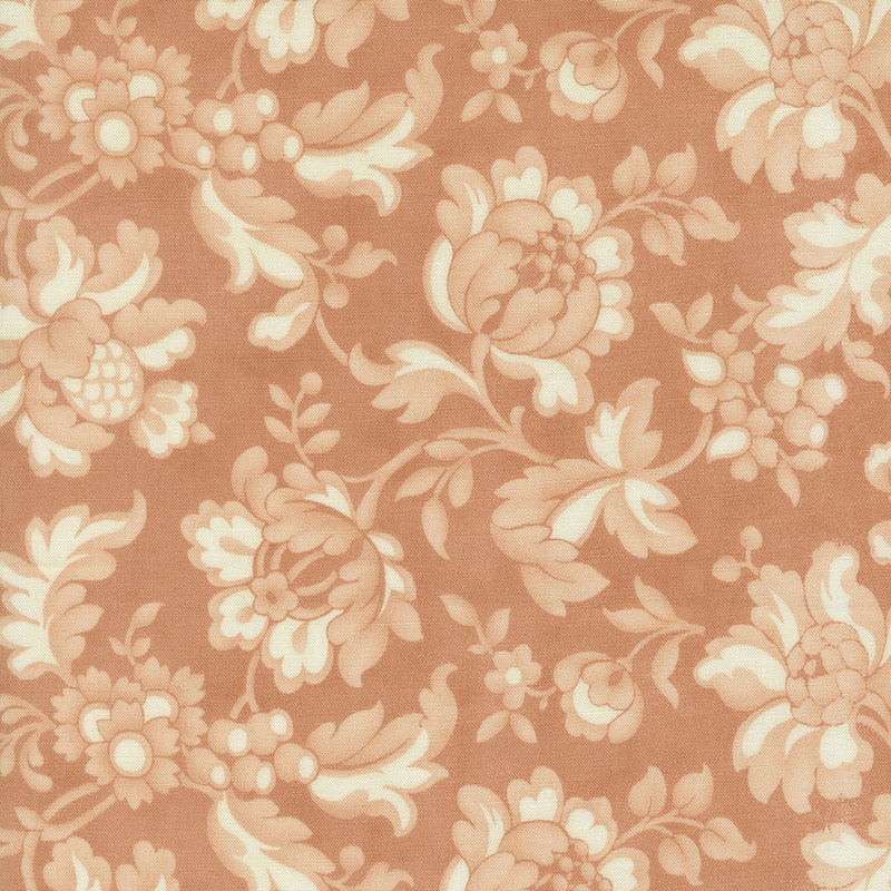Peachy rose and cream vintage floral fabric swatch.