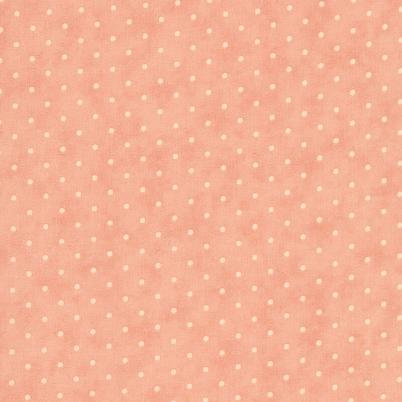 Tonal polka dot print on a mottled dark rose background.