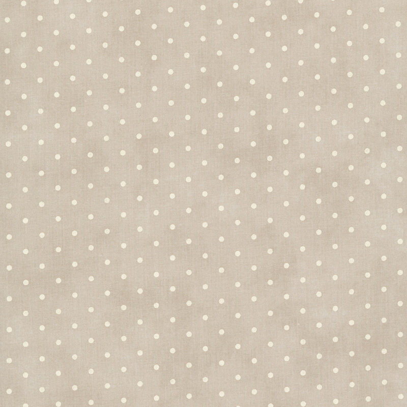 Tonal polka dot print on a mottled light taupe background.