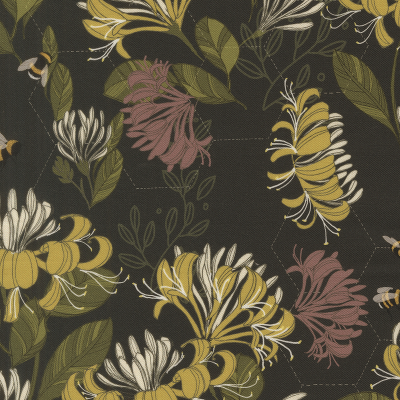 This black fabric features a honeycomb hexagon design layered beneath yellow and pink florals, with buzzing bees scattered throughout. 