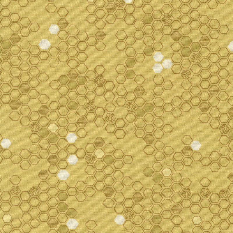 This butter yellow fabric features a hand drawn design of tonal hexagons. 